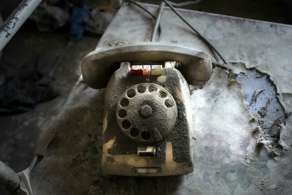 An old phone in an abandoned place