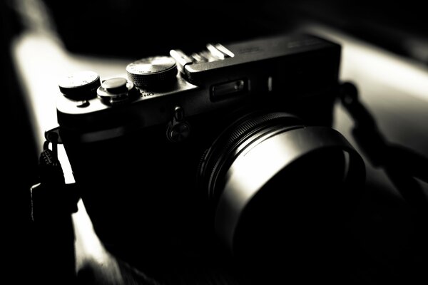 The object of a camera with a camera on a black background