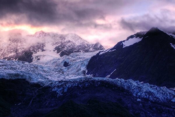 Mysterious glow over a mountain range