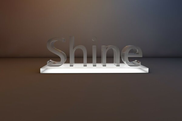 На стекле блестящая надпись shine