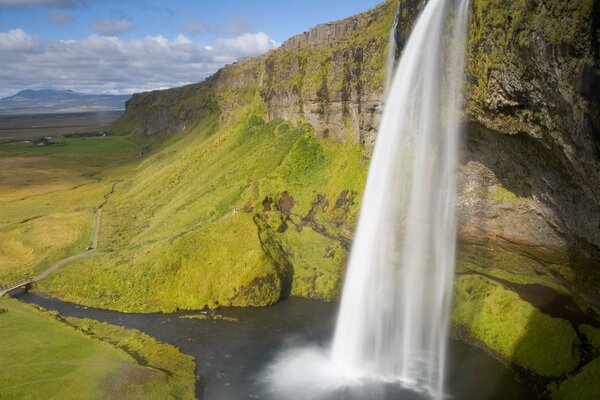 Waterfall of rocks in the mountains