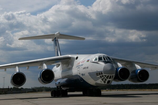 Military transport aircraft against the background of the sky
