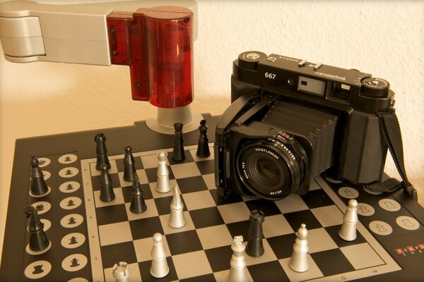 The camera takes a close-up game of chess