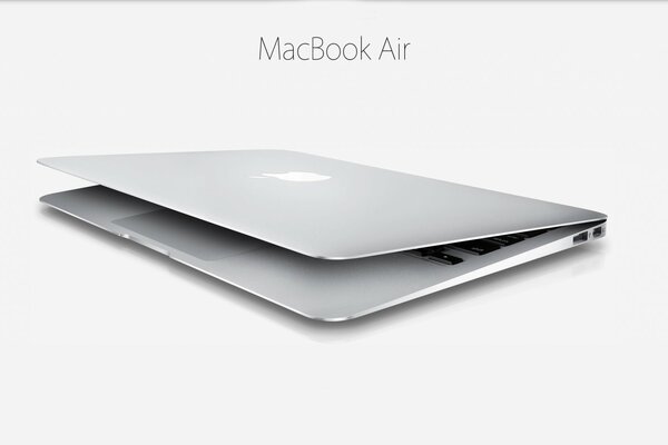 Image of a thin and light laptop with an apple