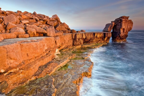 Red stones on the seashore