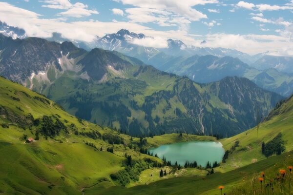 Green Altai ridges and clear azure lake