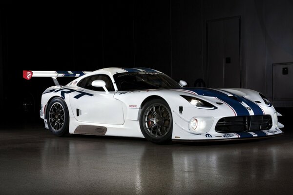 White racing car with blue stripes
