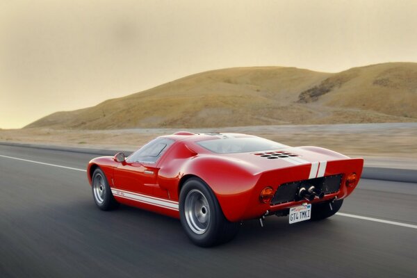 Beautiful red sports car on the road