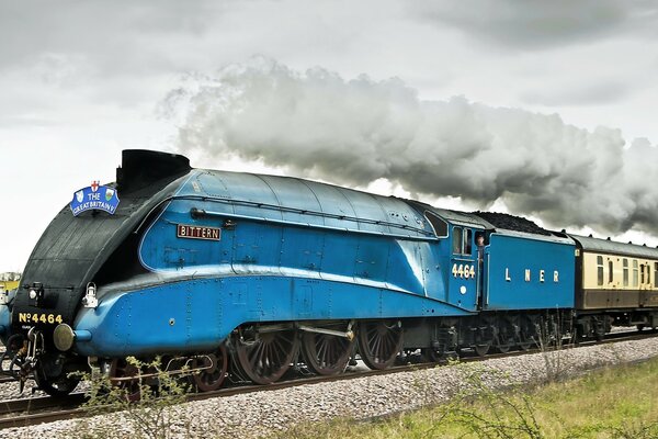 Blue train on the railway