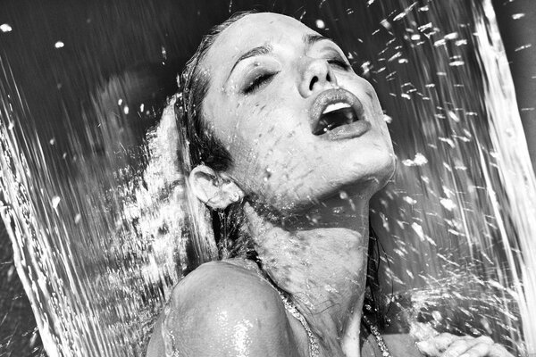 Angelina Jolie under the jets of water