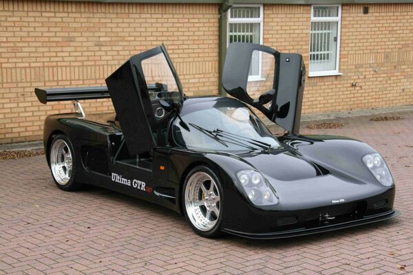 Sports car with open doors