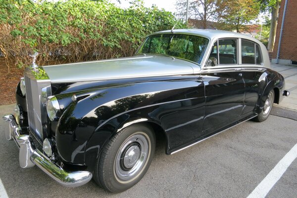 A large rare car in black