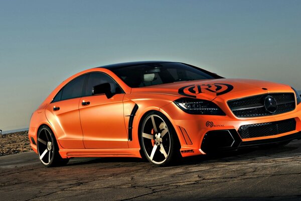 Orange Mercedes sedan bottom view