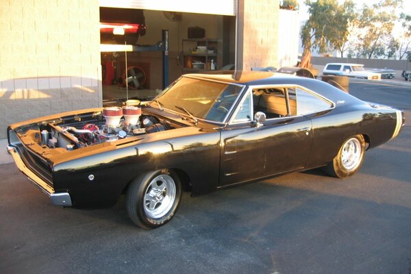 A 1968 supercar near the garage