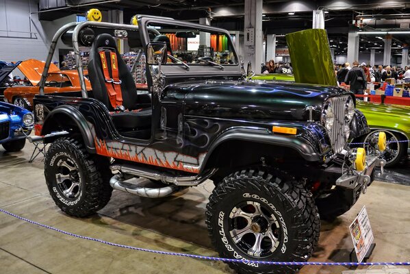 Exhibition of cars. Aggressive four-wheel drive car