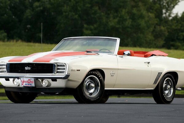 Classic maslcar convertible with red stripes