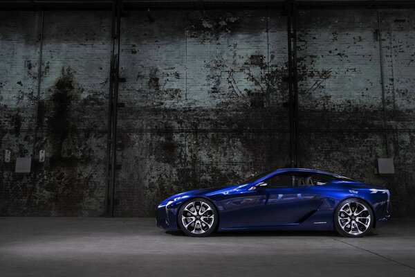 Blue car in concrete jungle