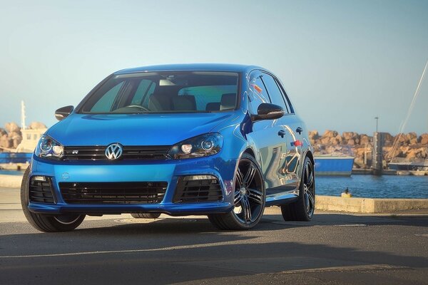 Blue car at a marine photo shoot