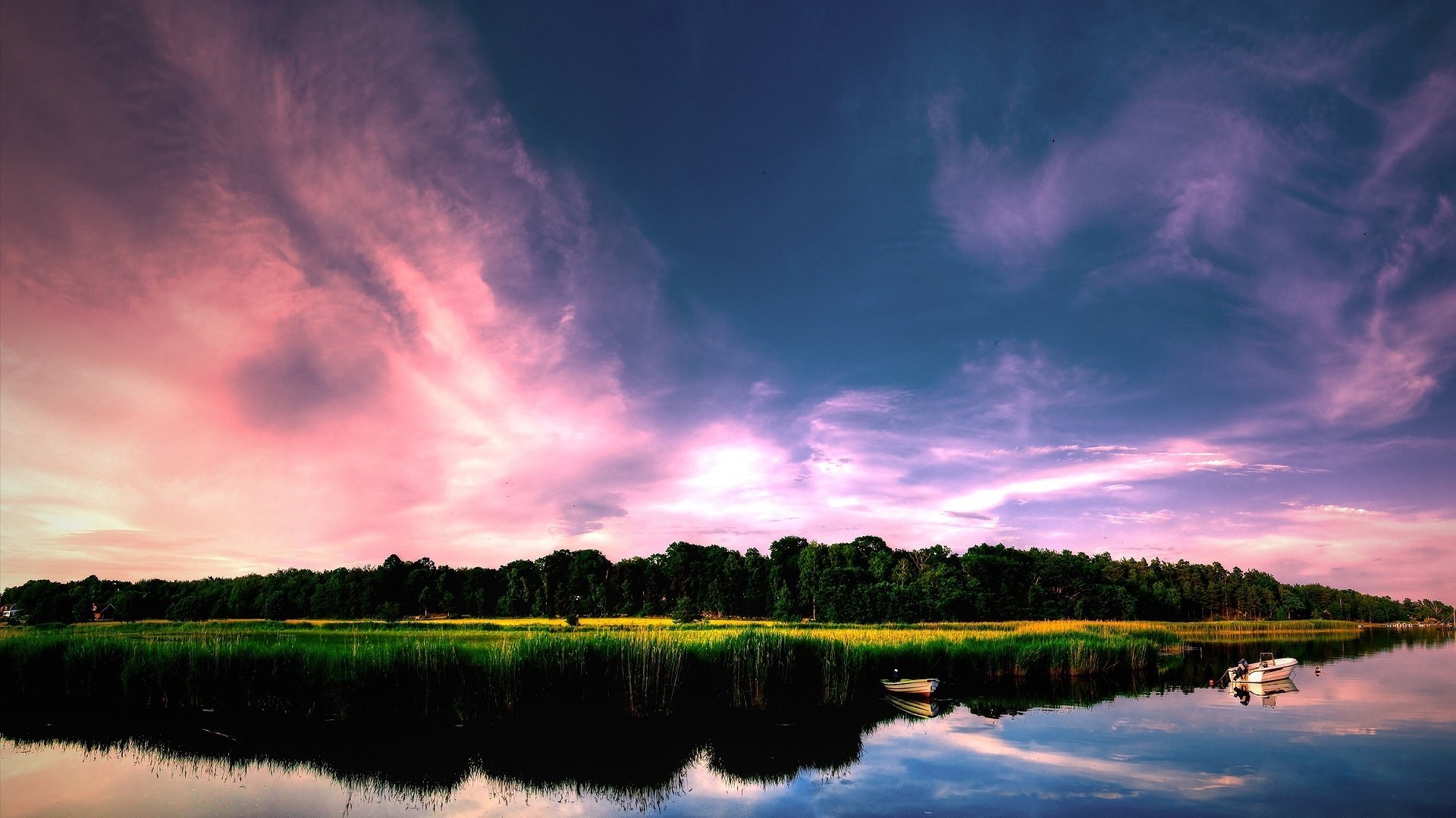 green island twilight pink sky the sky water forest river trees boat