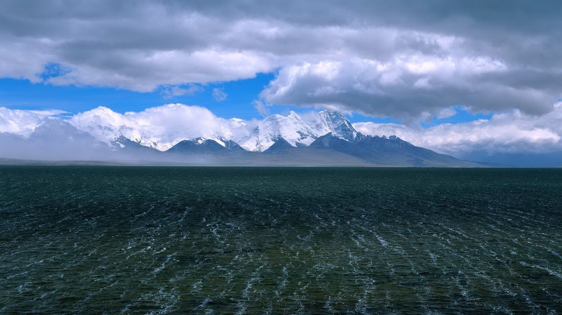 parpadeo de agua olas nubes montañas agua