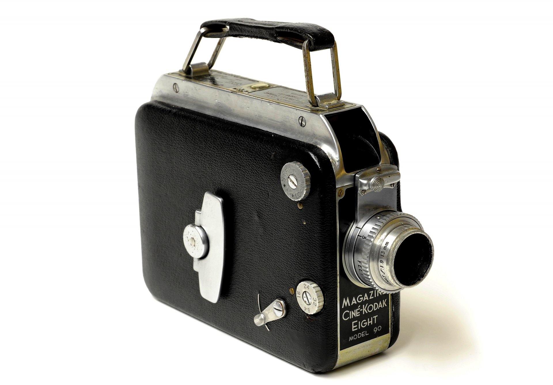 журнал сине-кодак восемь модель 90 кинокамера объектив kodak anastigmatic 13 мм f/1 серебристо-чёрный металлический корпус фон