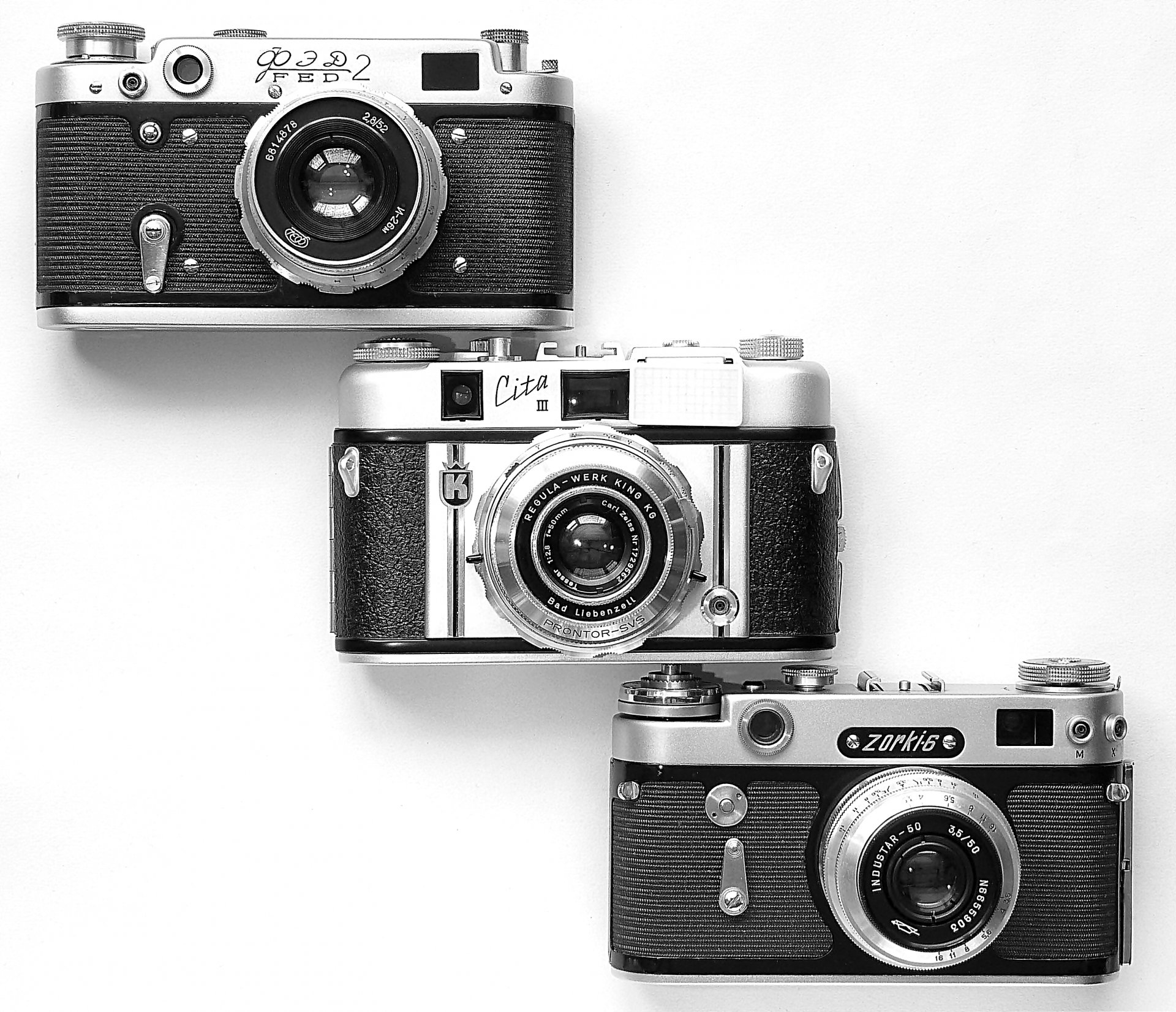 cameras sharp-6 cita iii carl zeiss tessar body lenses viewfinder self-timer sync curiosity white background