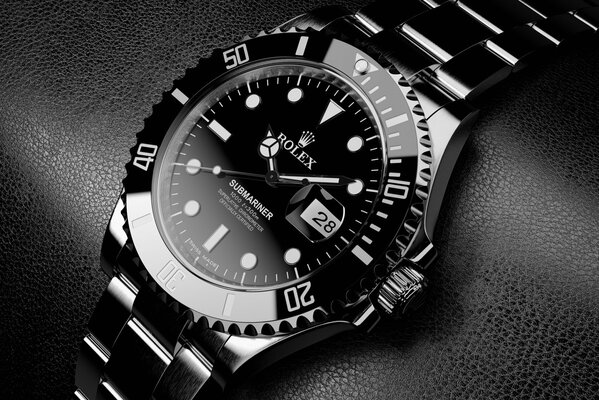 Schwarze Rolex Titanuhr mit Lederhintergrund