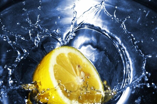 Half a lemon in a splash of water