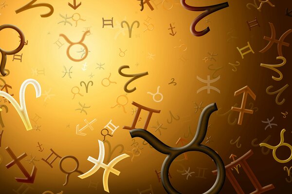 Símbolos de los signos del zodiaco en un fondo dorado