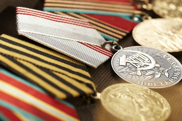 Order to a veteran of labor on a gray ribbon with red stripes