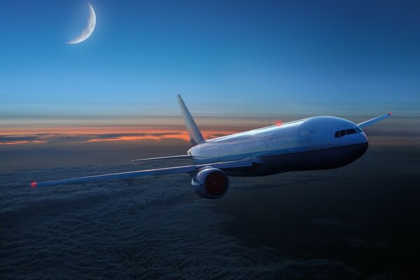 Flugzeug über Abendwolken mit Mond