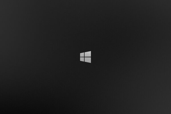 Sur fond noir - une fenêtre blanche du logo Windows