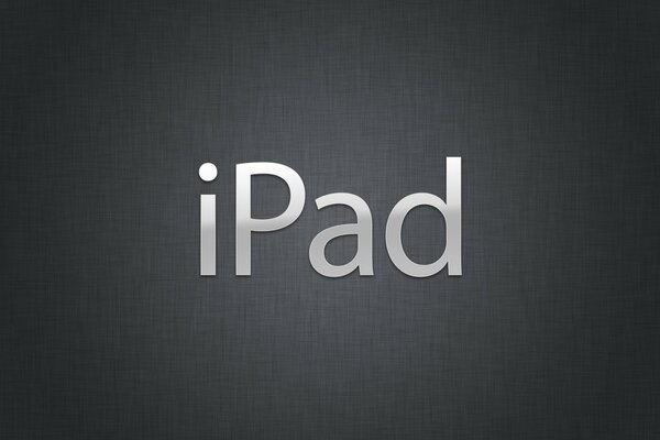 iPad metal letters on a gray background