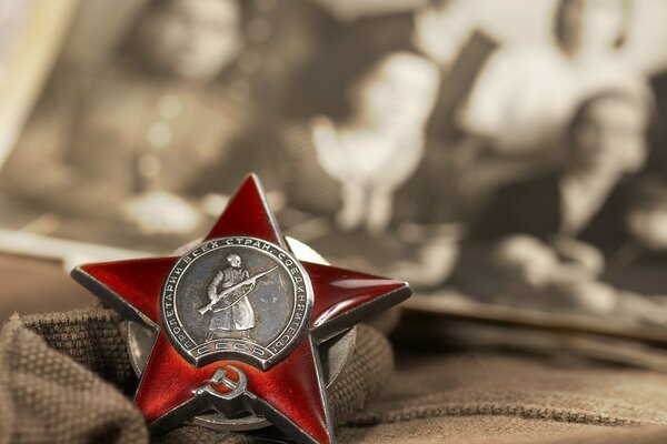 Order of the Red Star on the background of a blurry photo