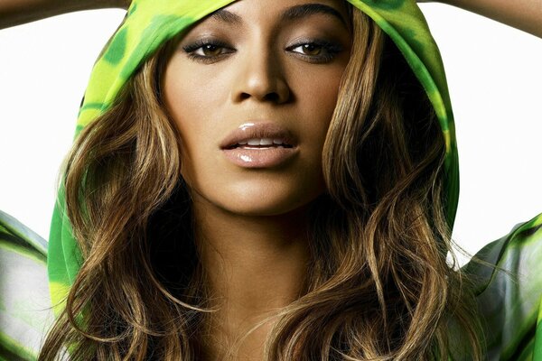 Beyonce in a green hood