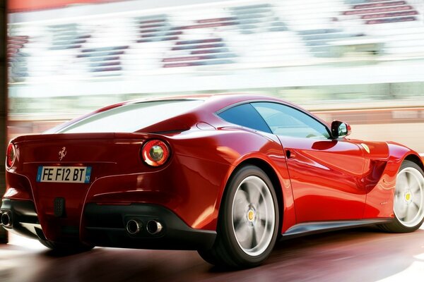 Beautiful red car with grey wheels