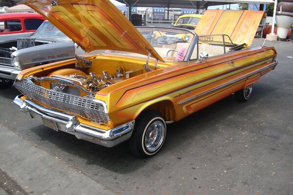 Yellow corvette Impala lowrider