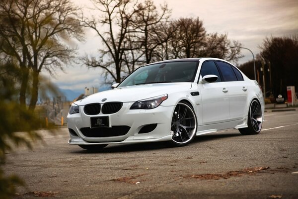 White tinted BMW in the parking lot