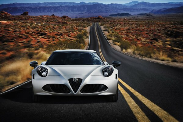 White Alfa Romeo 2014 on the road