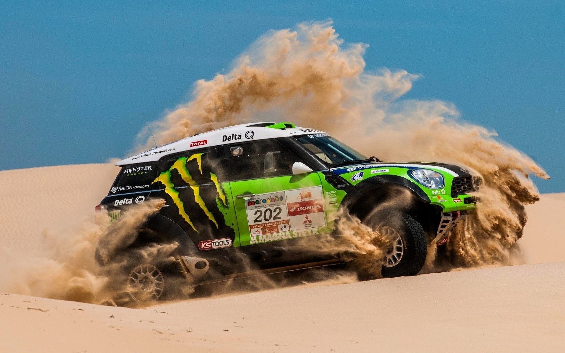 mini cooper green x-raid rally to dakar desert