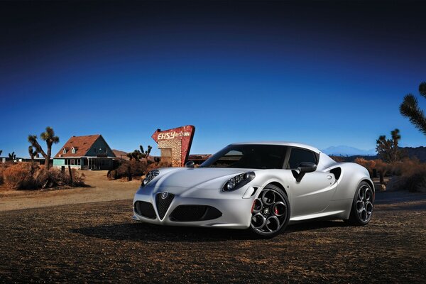 White Alfa Romeo 2014 on a deserted road in Mexico