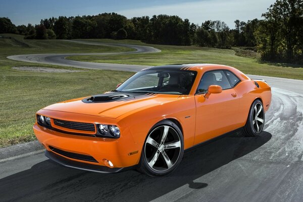 Orange car on a spiral road