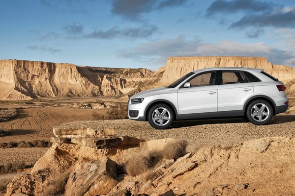 White Audi in the desert off-road