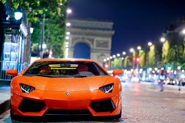 Orange lamborghini on the streets of Paris