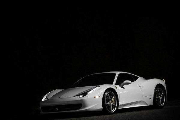 White Ferrari on a black background