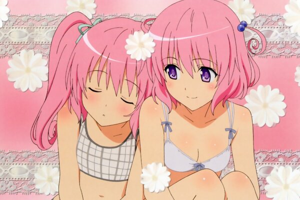 Anime ragazze con i capelli rosa e in reggiseno