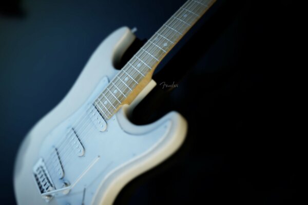 White electric guitar - musical instrument