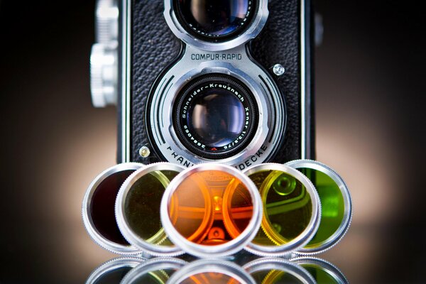 Camera with multi-colored retro lenses