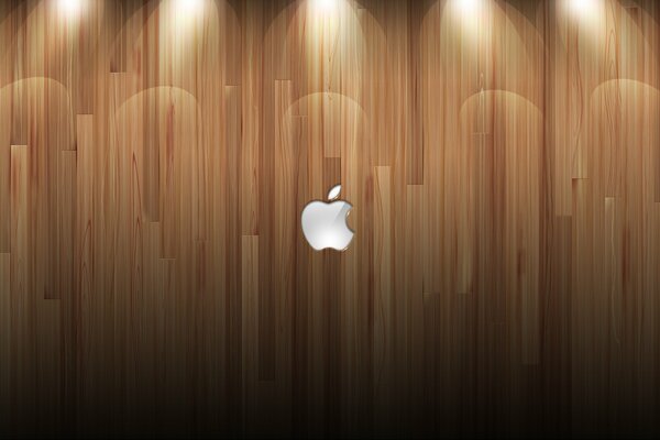 Логотип компании яблоко на деревянном фоне