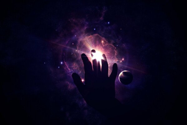 A man s hand reaches out to the stars